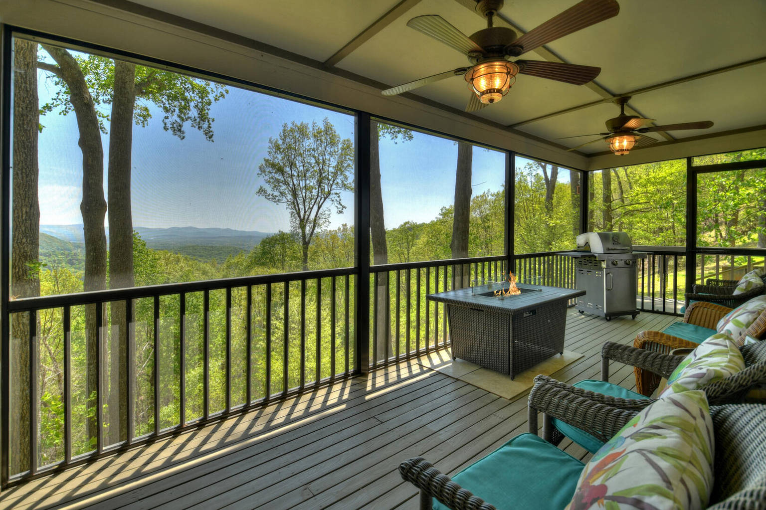 Dancing Bear has an magnificent view of the North GA Mountains, plus a hot tub and large